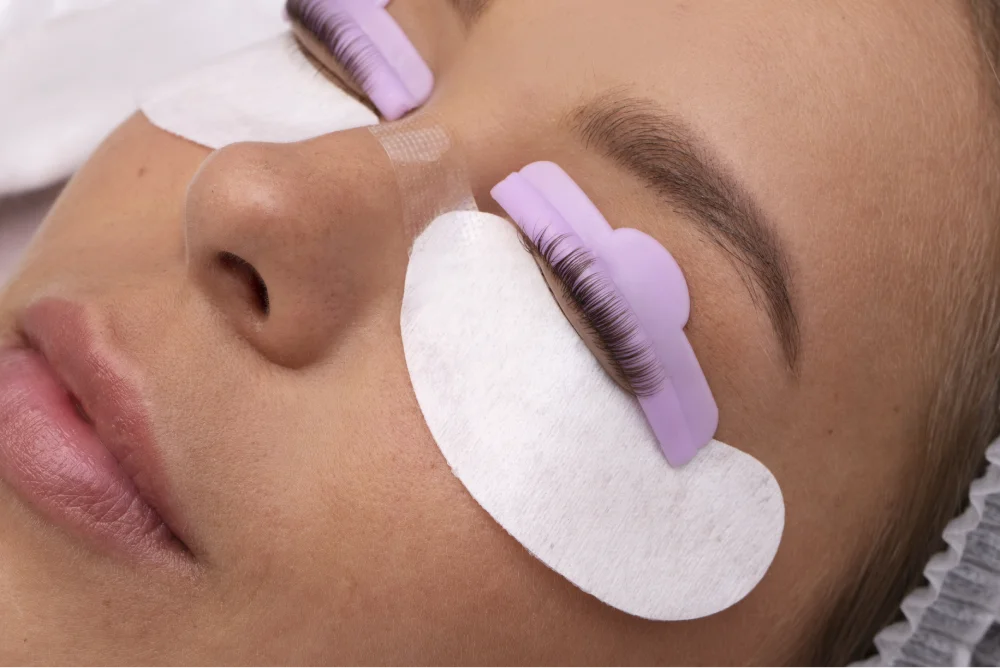 woman wearing eye patches high angle